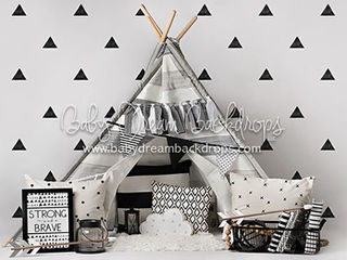 Modern black and white kids' photo backdrop with teepee, triangle pattern wall, pillows, and minimalist boho decor – perfect for birthday portraits