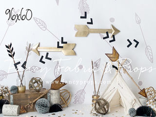 Neutral Wild One birthday photo backdrop with gold arrows, black chevrons, mini teepee, and tribal decor – ideal for rustic cake smash sessions