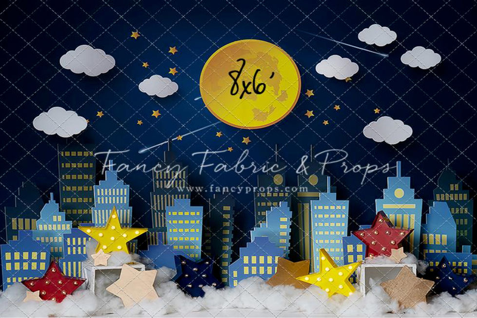 City skyline photography backdrop with moon, stars, and clouds against a night sky at Shutter Swan Studios in Lakeland, FL – perfect for kids' portraits