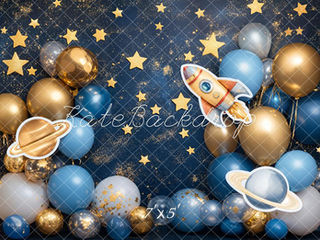 Space-themed photo backdrop with golden stars, planets, rocket, and blue/gold balloon garland at Shutter Swan Studios in Lakeland, FL.