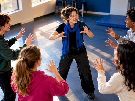 Teenagers playing a theatre warm-up game