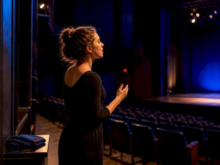 Young singer cooling down in empty theatre