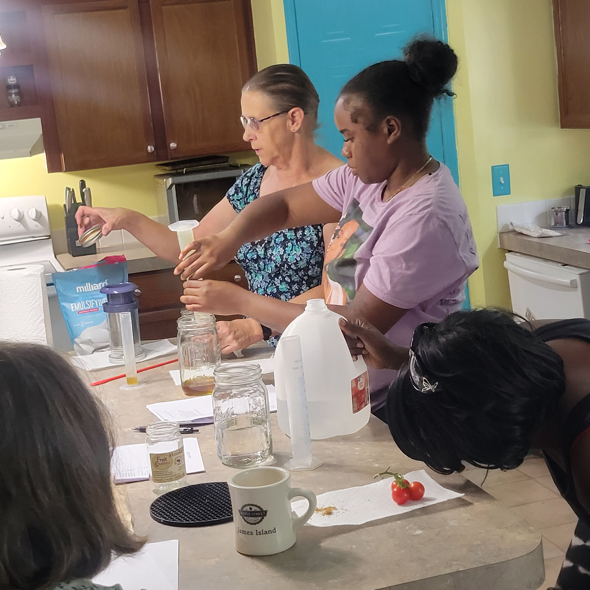 Students measuring out oils