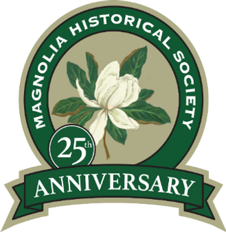 Circular logo with a white magnolia flower and leaves in the center, surrounded by a dark green ring and the words "Magnolia Historical Society." Green banner-style text at the bottom reads "25th Anniversary."