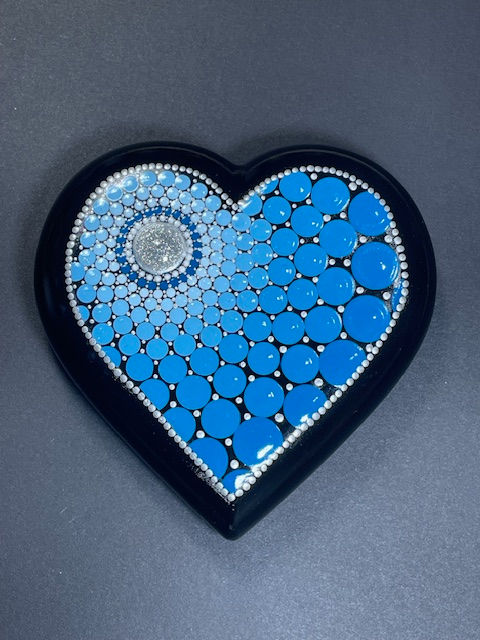 blue heart shaped mandala stone, top view