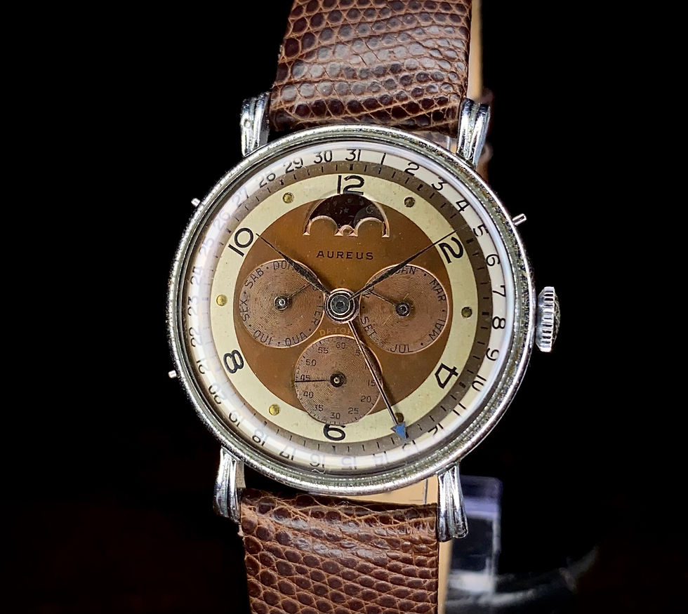 Thumbnail: 1950s Aureus Record Datofix Triple Date Moonphase cal 107 fancy lug tropicalized
