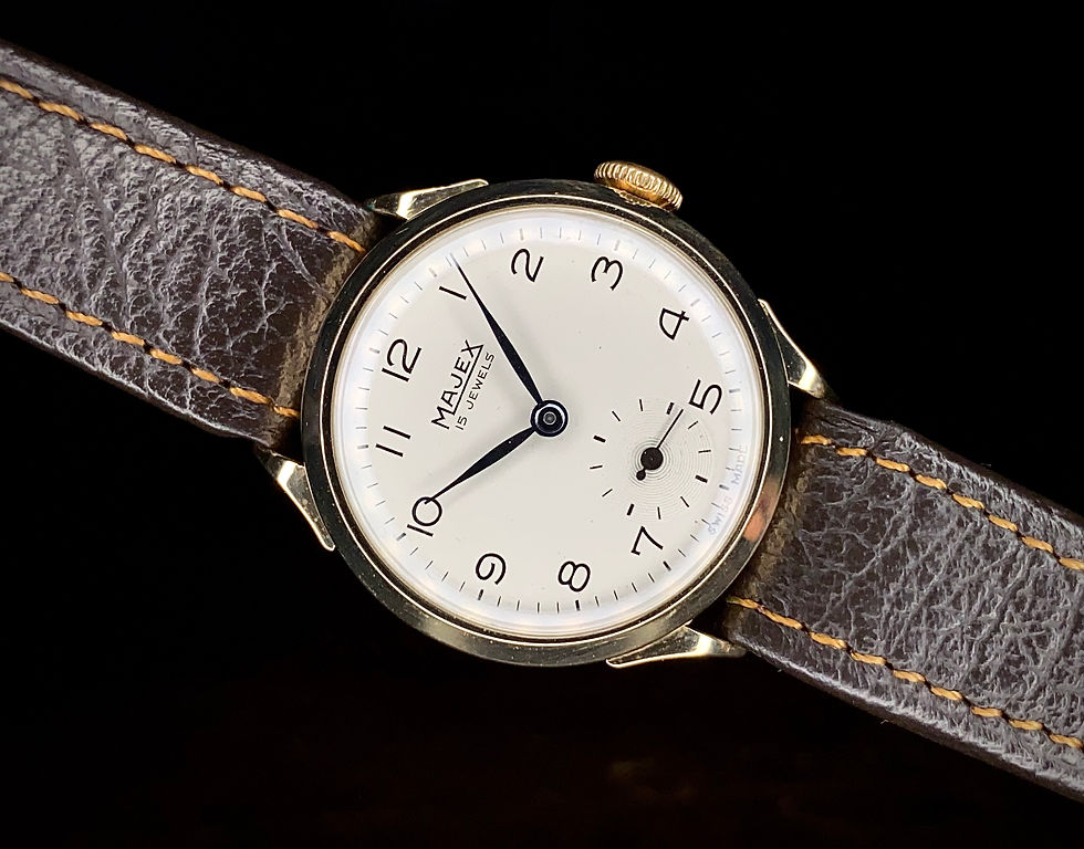 Thumbnail: 1952 9ct gold Majex dress watch with horn lug design, pierce 103 movement