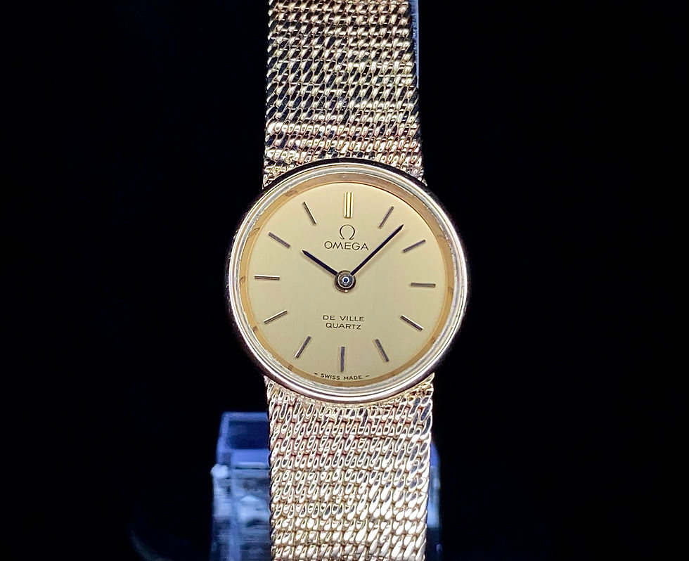 1980s 20mm Ladies Omega De Ville Quartz watch 1353 9ct gold integrated bracelet