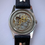Thumbnail: 1950s Cyma Navystar Cymaflex Gilt Black dial gold markers ref 25678-6  R.467