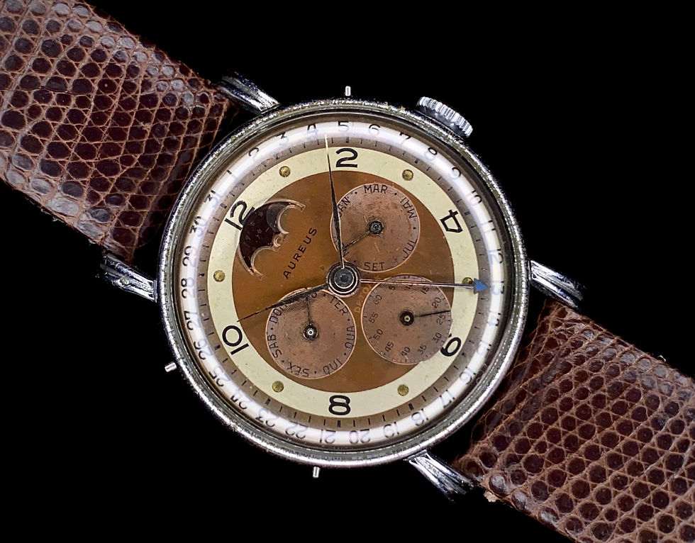 Thumbnail: 1950s Aureus Record Datofix Triple Date Moonphase cal 107 fancy lug tropicalized
