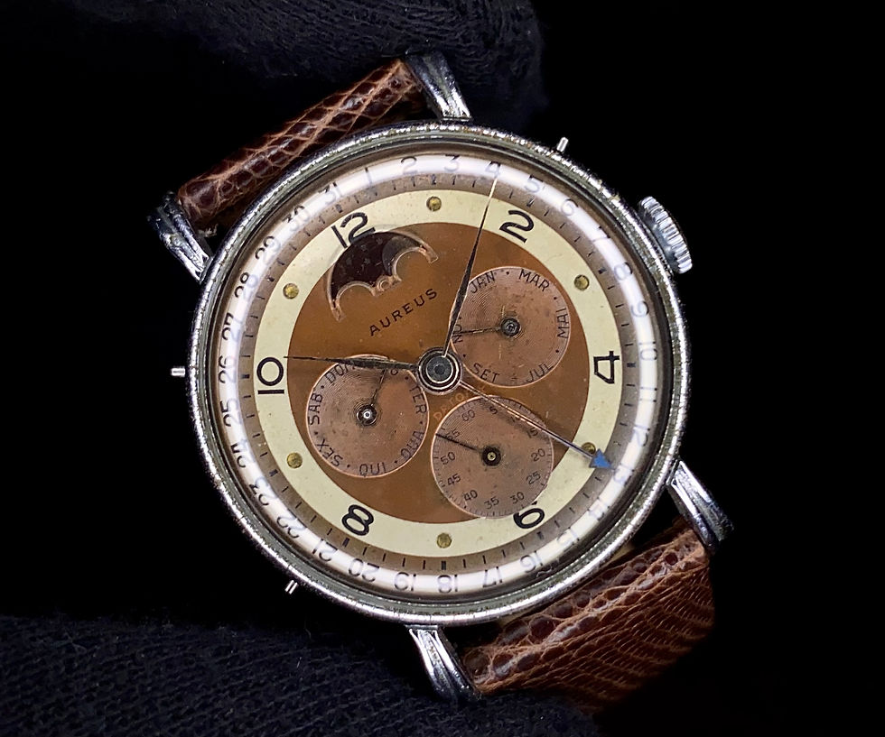 Thumbnail: 1950s Aureus Record Datofix Triple Date Moonphase cal 107 fancy lug tropicalized