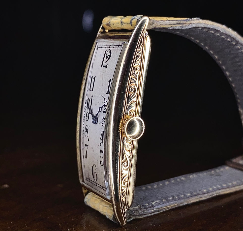 Thumbnail: 1920s Art Deco 18ct gold rectangular Banana watch with Movado movement serviced