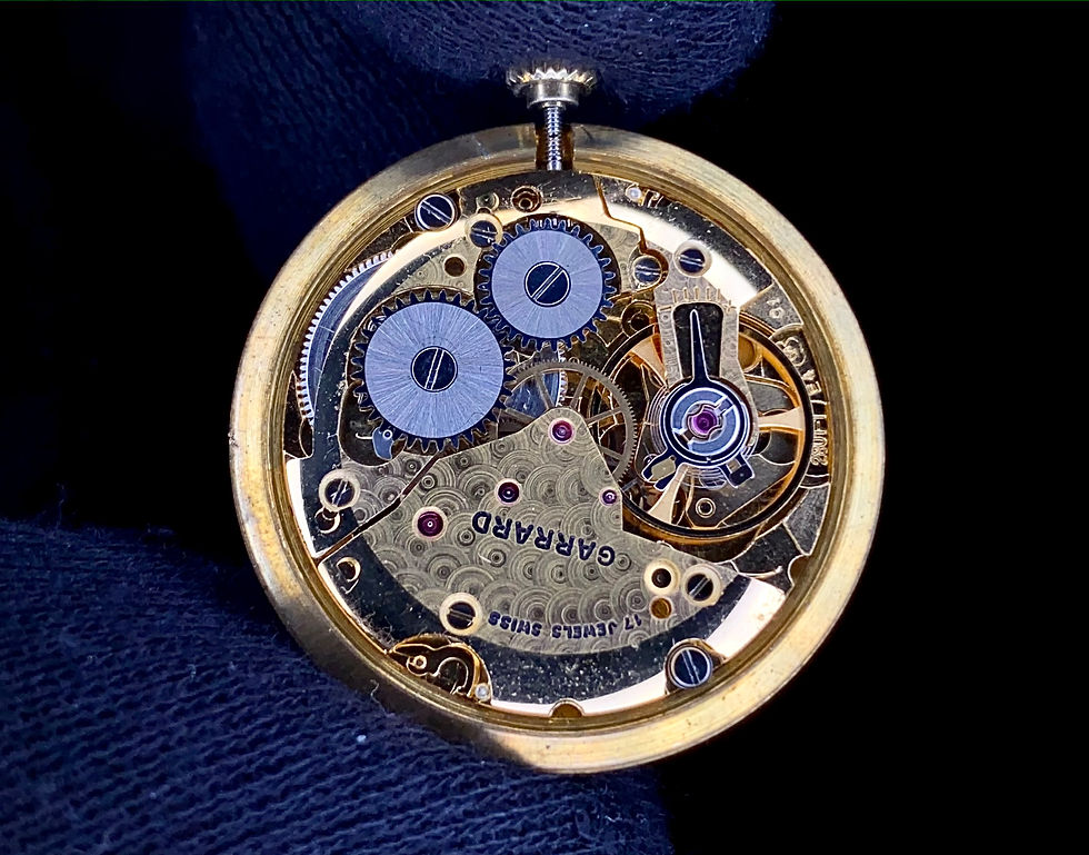 Thumbnail: 1980s Garrard 9ct gold circular dress watch sunburst dial ETA 2801-1 boxed paper