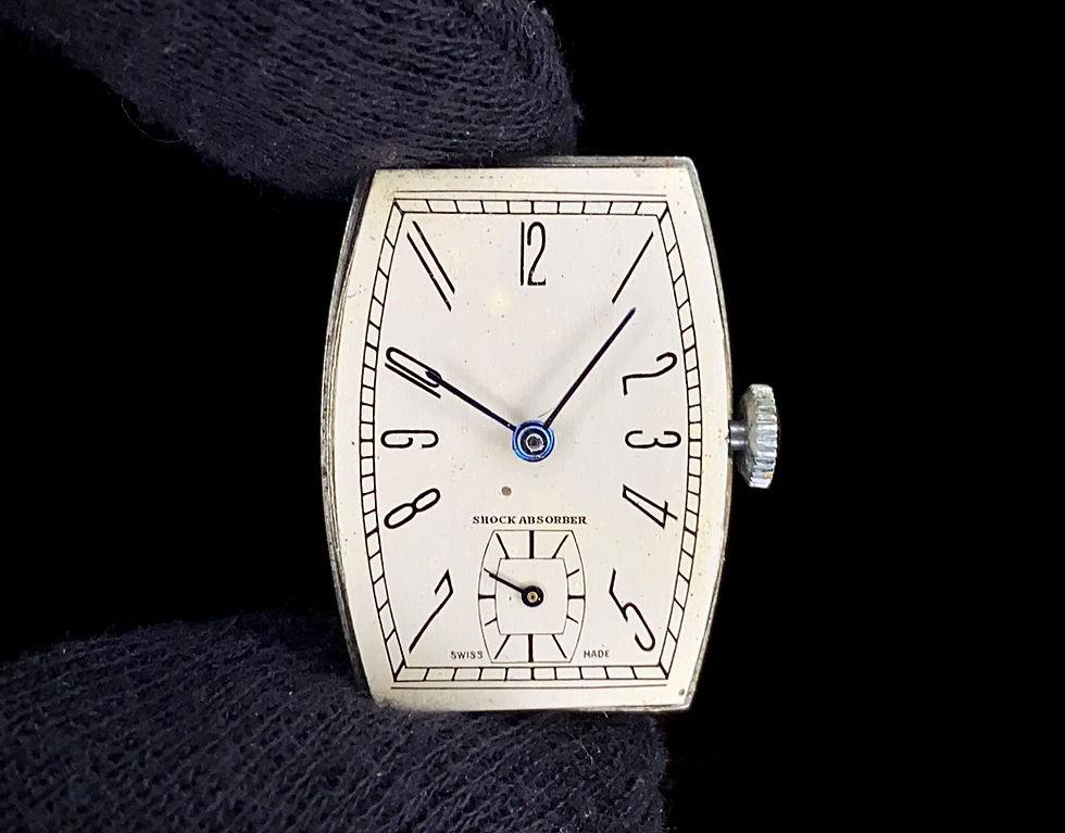 Thumbnail: 1930s Bauhaus exaggerated numeral tonneau tank watch, shock proof movement
