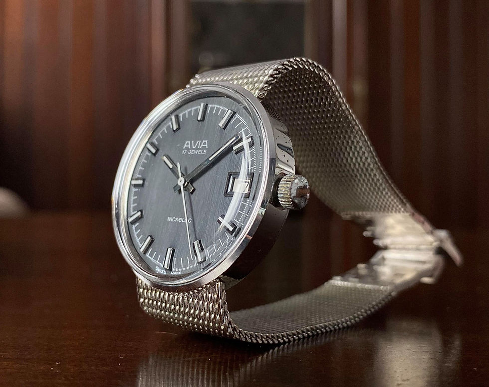 Thumbnail: 1970s Avia Dress Watch with dark Grey grained dial, integrated strap, FHF 96-4