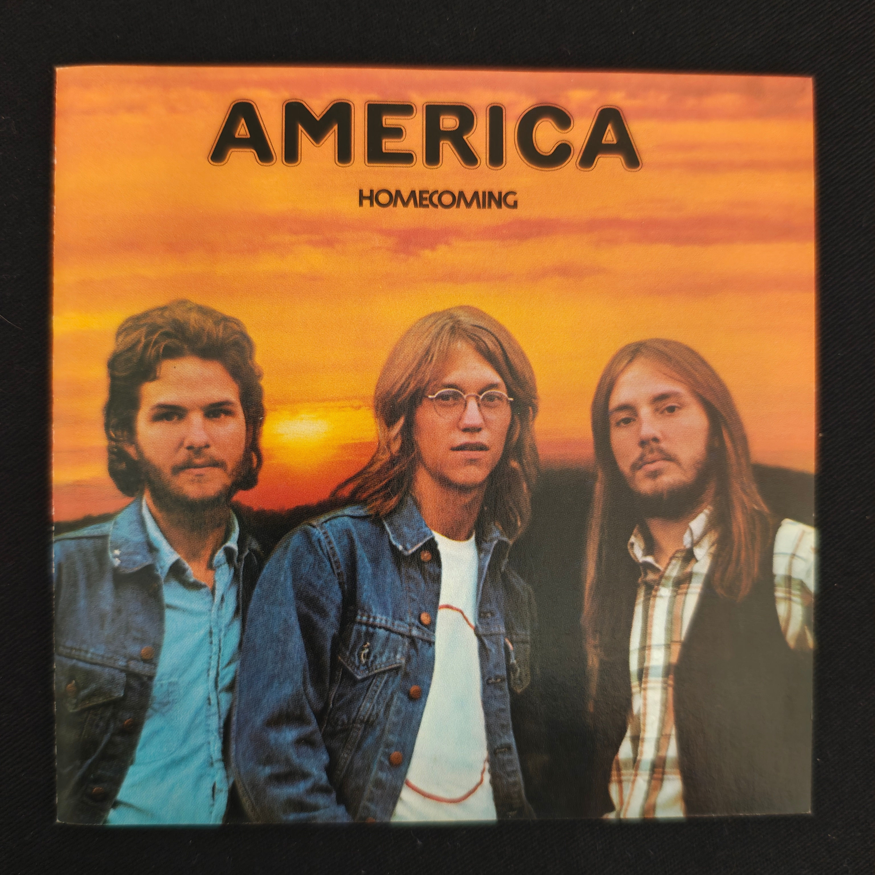 America - Homecoming (CD | capa jewelcase + encarte)
