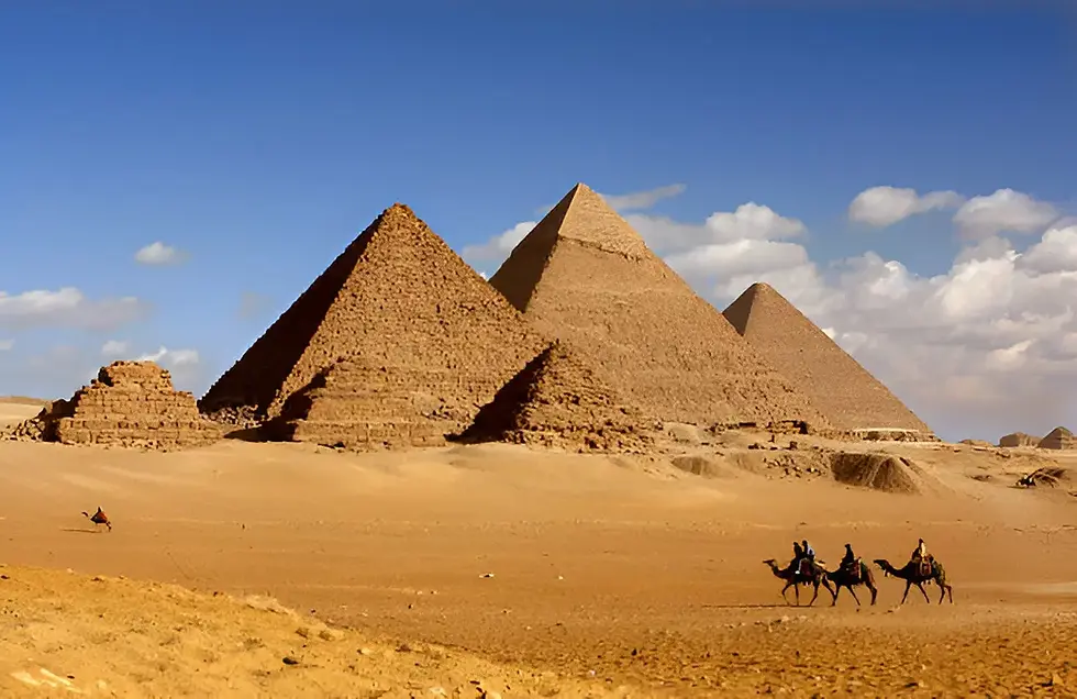 Eye-level view of the Great Pyramid of Giza under a clear blue sky