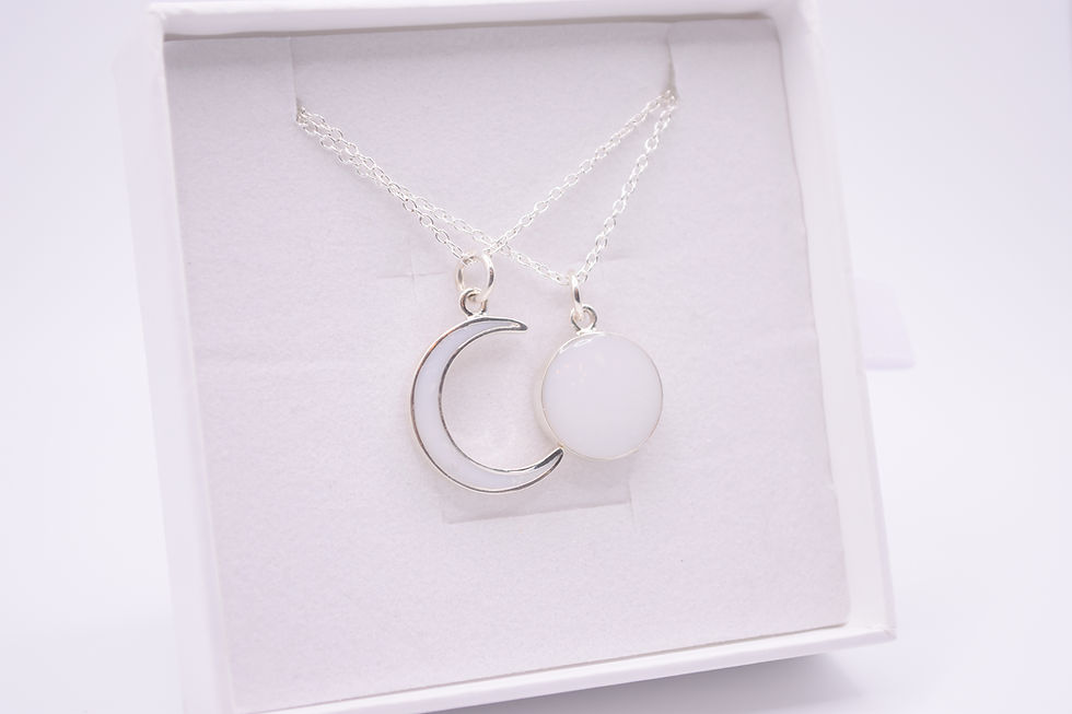 Close-up view of a beautifully engraved locket necklace