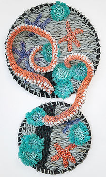 woven art using reclaimed fishing rope dipicting octopus arms, sea anenomes and sea stars