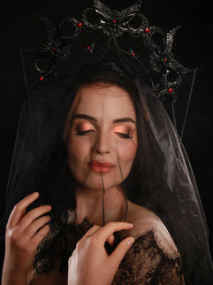 alternative bridal boudoir female in black veil