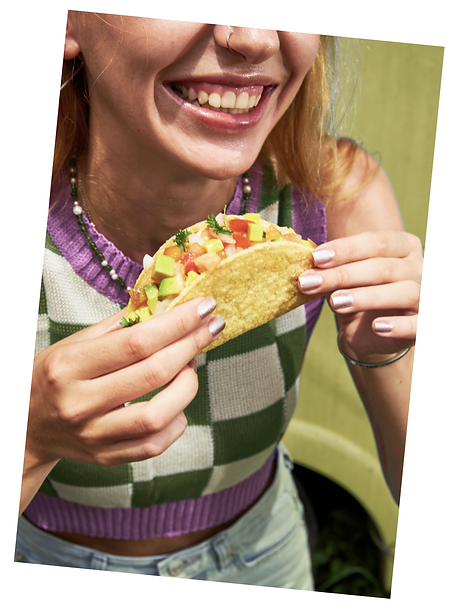 Woman enjoying a taco