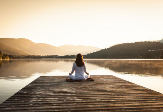 An image of a person meditating or a serene landscape, symbolizing the peace o
