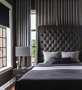 Bedroom in black, silver, white and hues of gray.