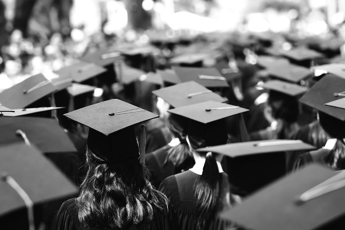 high-angle-view-students-wearing-graduation-gowns-standing-outdoors_edited.jpg