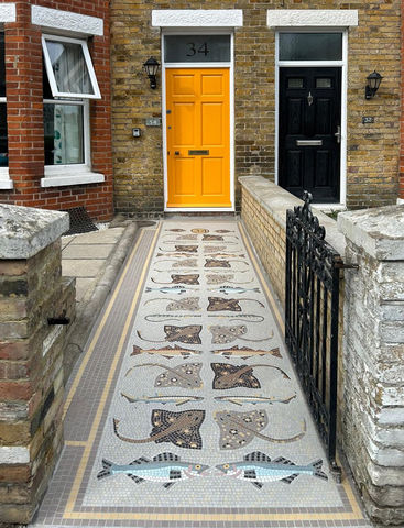 Mosaic pathway at front of Victorian Home depicting different fishes found along the coastline of Broadstairs, England