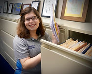 Transition Program student working on filing.