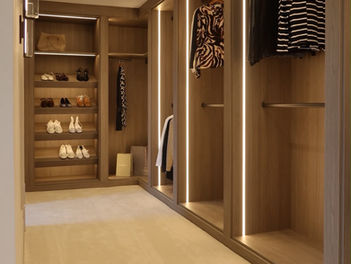 Luxury bedroom and dressing area with integrated lighting