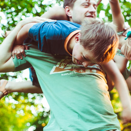 Kids learn valuable life skills through rough-and-tumble play with their dads