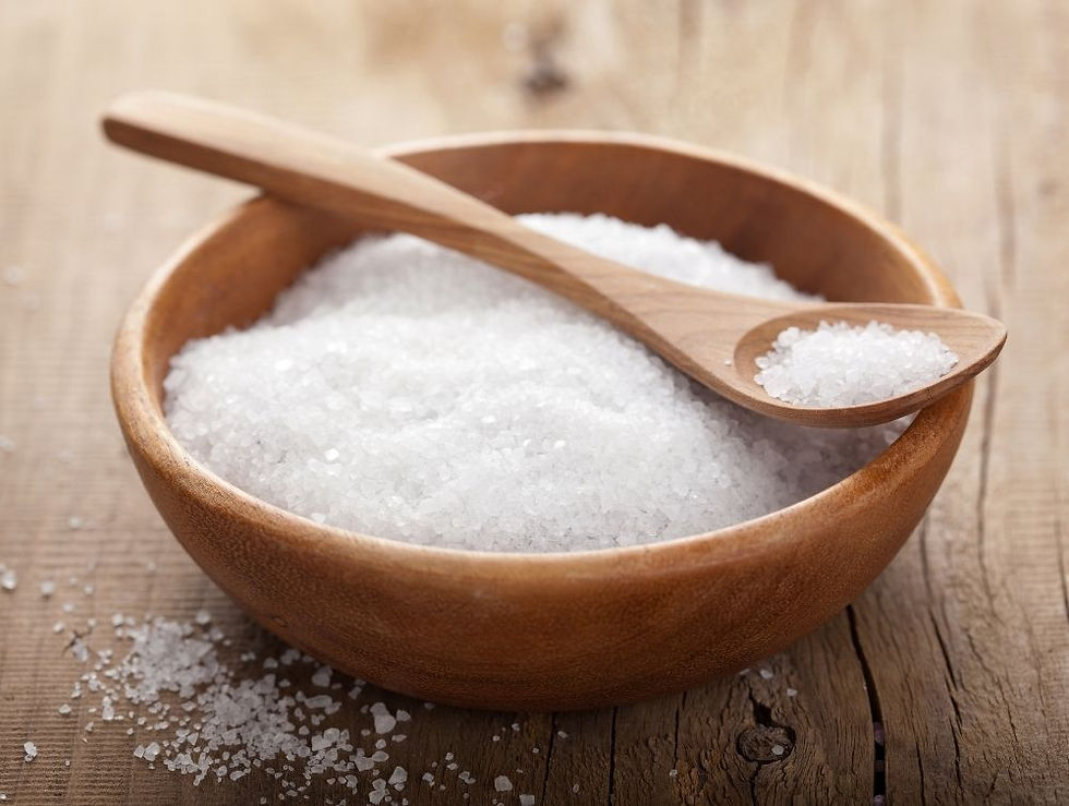 bowl of salt with wooden spoon