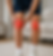 Man holding painful knees