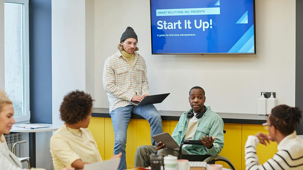 Inclusive team meeting discussing startup strategies at a modern office setting.