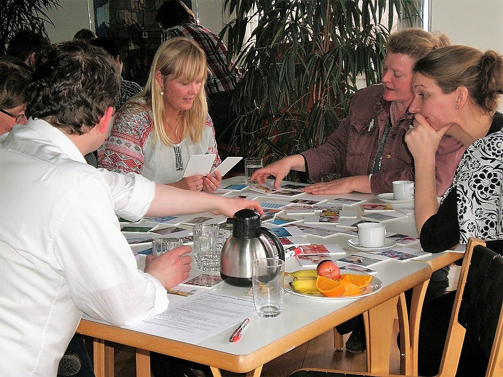 High angle view of a community workshop with participants discussing urban plans