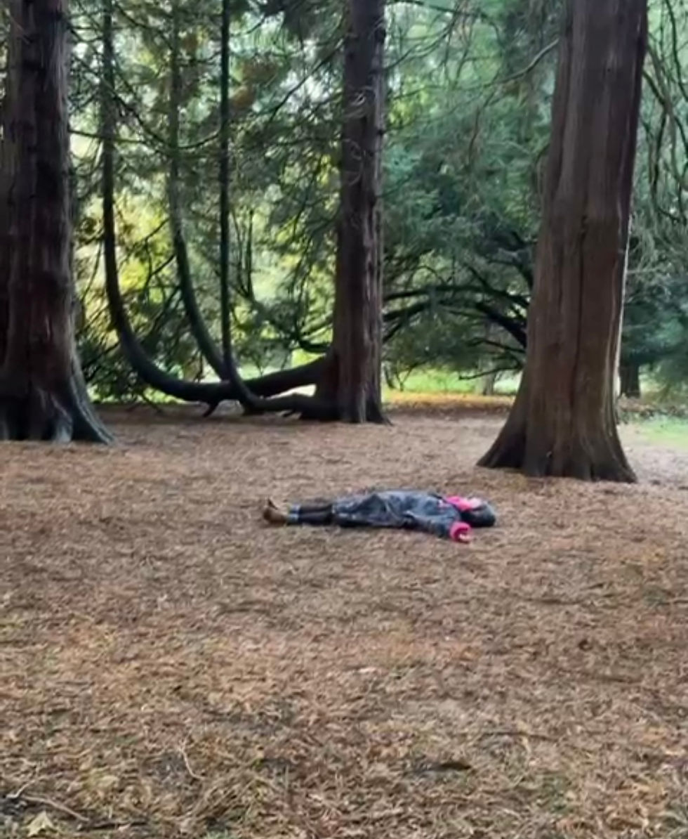 yoga teacher letting go in nature