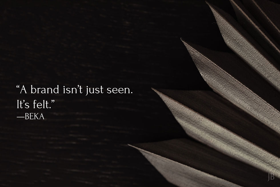 Text on dark background: "A brand isn't just seen. It's felt." —BEKA. Right side shows a dried palm leaf in shades of black and brown.