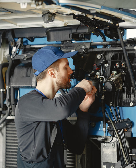 mechanic fixing truck