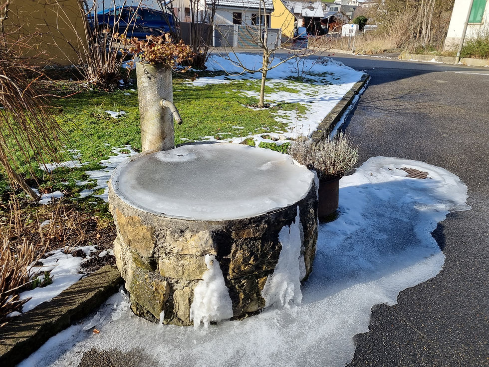 Brunnen mit Quellwasser