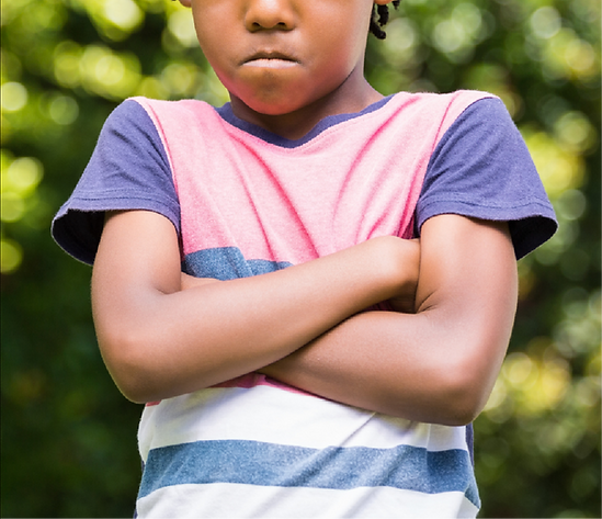 Frustrated child with arms crossed, showing PDA profile.
