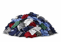 Mixed-color fabric pile on white backdro