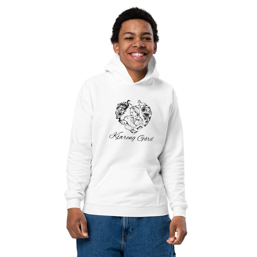 Young man wearing a white XS hoodie with a farm logo