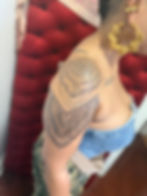 shoulder and upper arm jagua tattoo sleeve