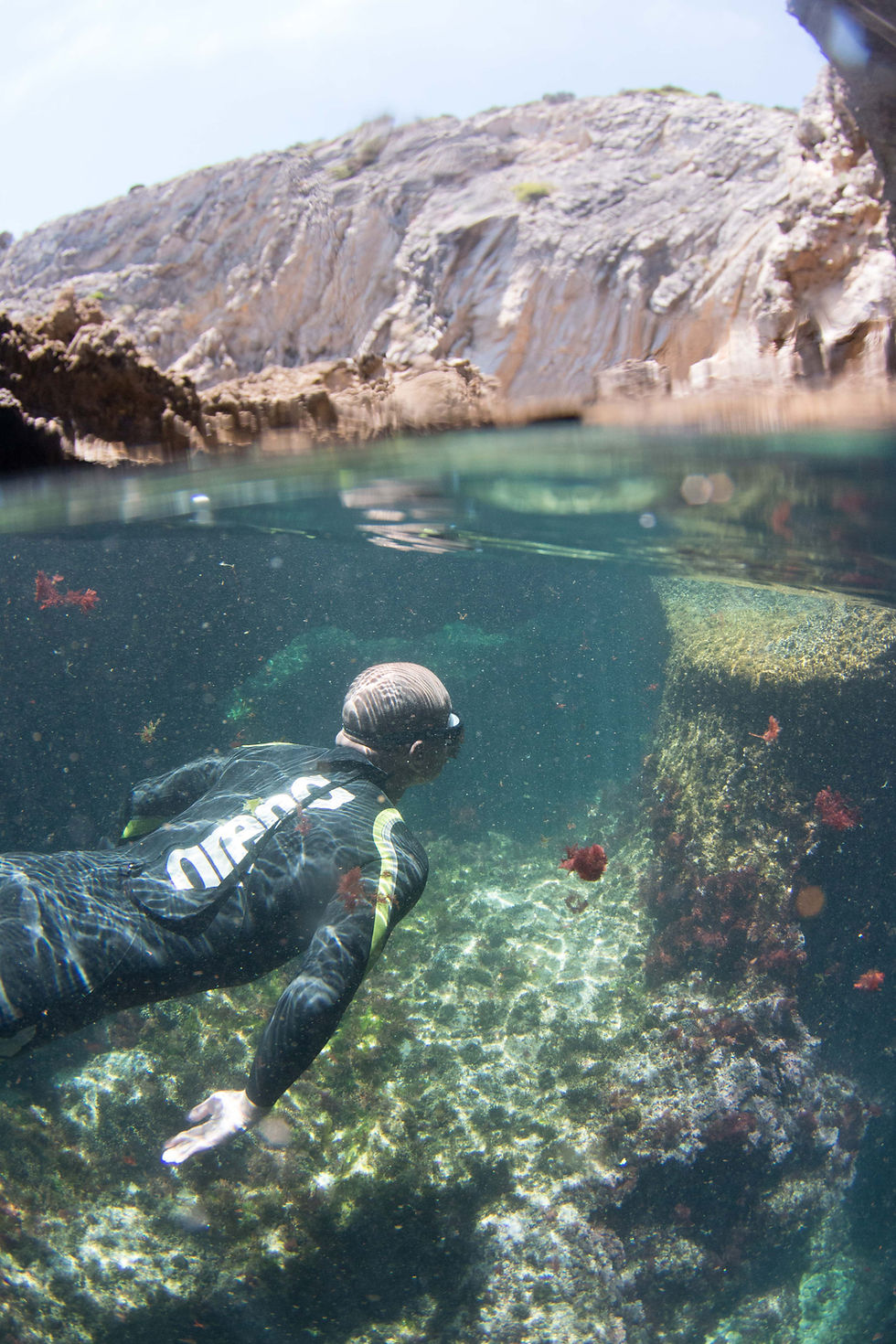 Swimming in the clear waters of Sesimbra