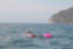 Swimmer swimming his first open water experience in the sea