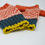 Thumbnail: " Dundee graphics" orange, forest green, yellow fingerless gloves
