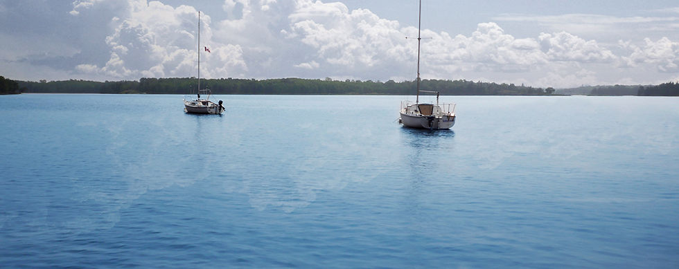 Two boats on calm water