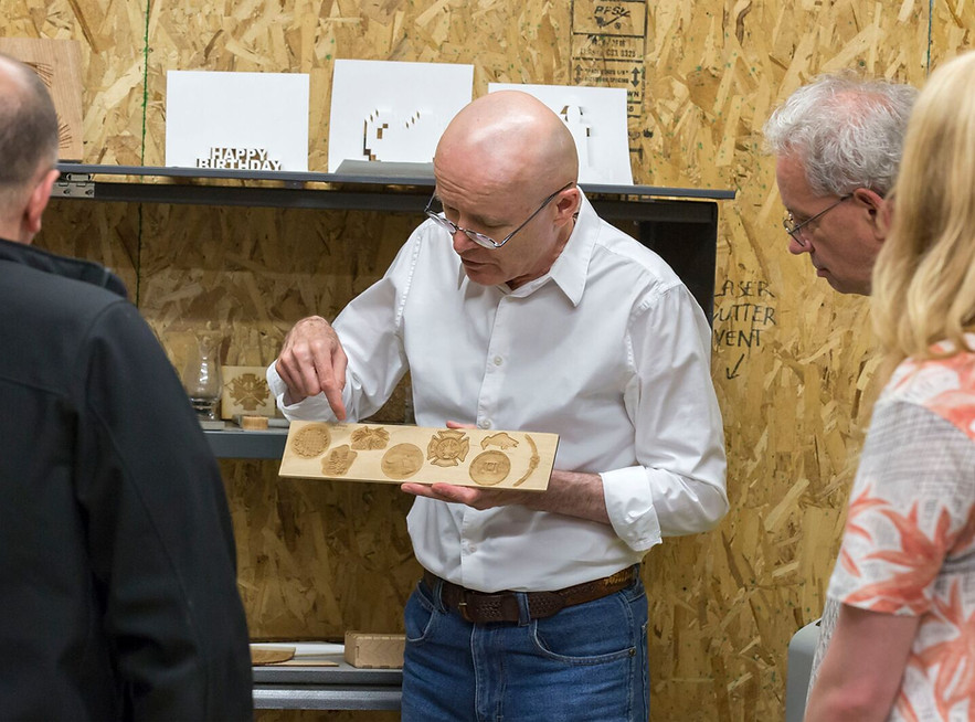 Man leading a tour of the Fablab