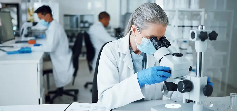 Senior pathologist reviewing specimens with high-resolution microscope – advanced Pathology Lab Services with fast, clear results.